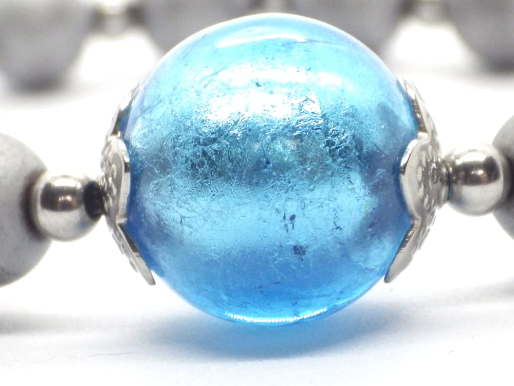 Conjunto de joyería pendientes, collar y pulsera en acero inoxidable, hematites y cuentas de cristal de Murano azul turquesa