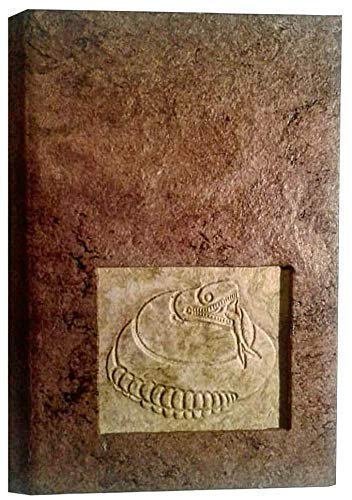 Aztec Serpent Hardcover Notebook. Engraved and lined in amate paper. It has a strip to replace the notebook when the sheets are finished. Size: 6.5 x 4.7 In.