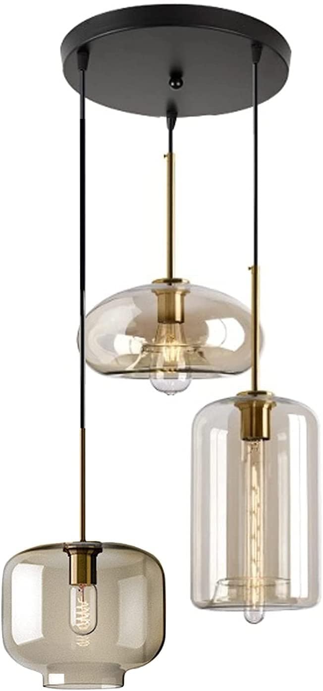 Lampes suspendues en verre ambré pour illuminer votre salle à manger