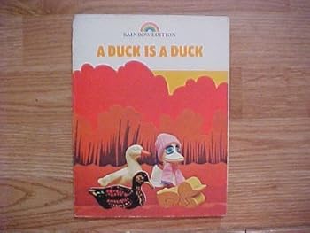 Paperback A Duck Is a Duck (Reading 720 Rainbow Edition, Level 3) Book