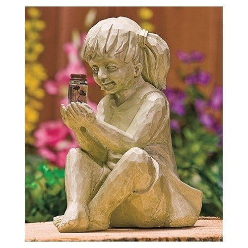 Fireflies in a Glass Solar Light with Girl Holding in Hand