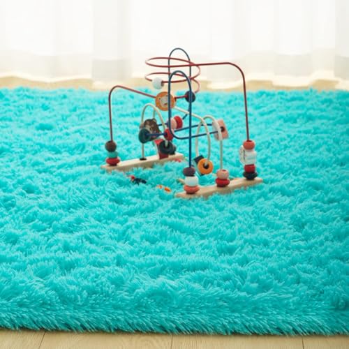 Image of Shaggy Round Area Rug - Soft Plush Circle Solid Color Carpet for Living Room, Bedroom, Kids Room - Fluffy Fuzzy Floor Mat for Home Decor (Turquoise, 4x4 feet, Round)