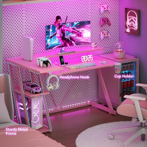 Image of Korfile 47 Inch Pink Gaming Desk with Power Outlet & LED Lights, Corner Computer Desk with 3 Tiers Storage Shelves, L Shaped Gaming Desk with Monitor Stand for Bedroom