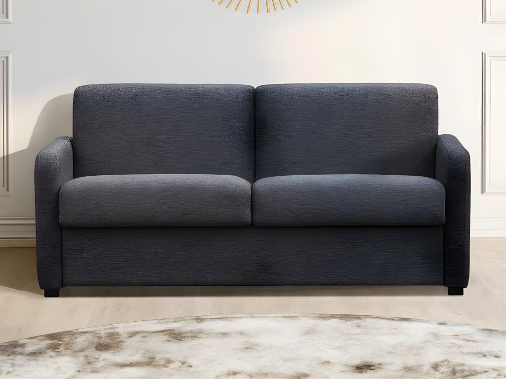 Vente-unique TOMAKA 3-seater sofa bed in anthracite fabric, positioned in a living room setting.