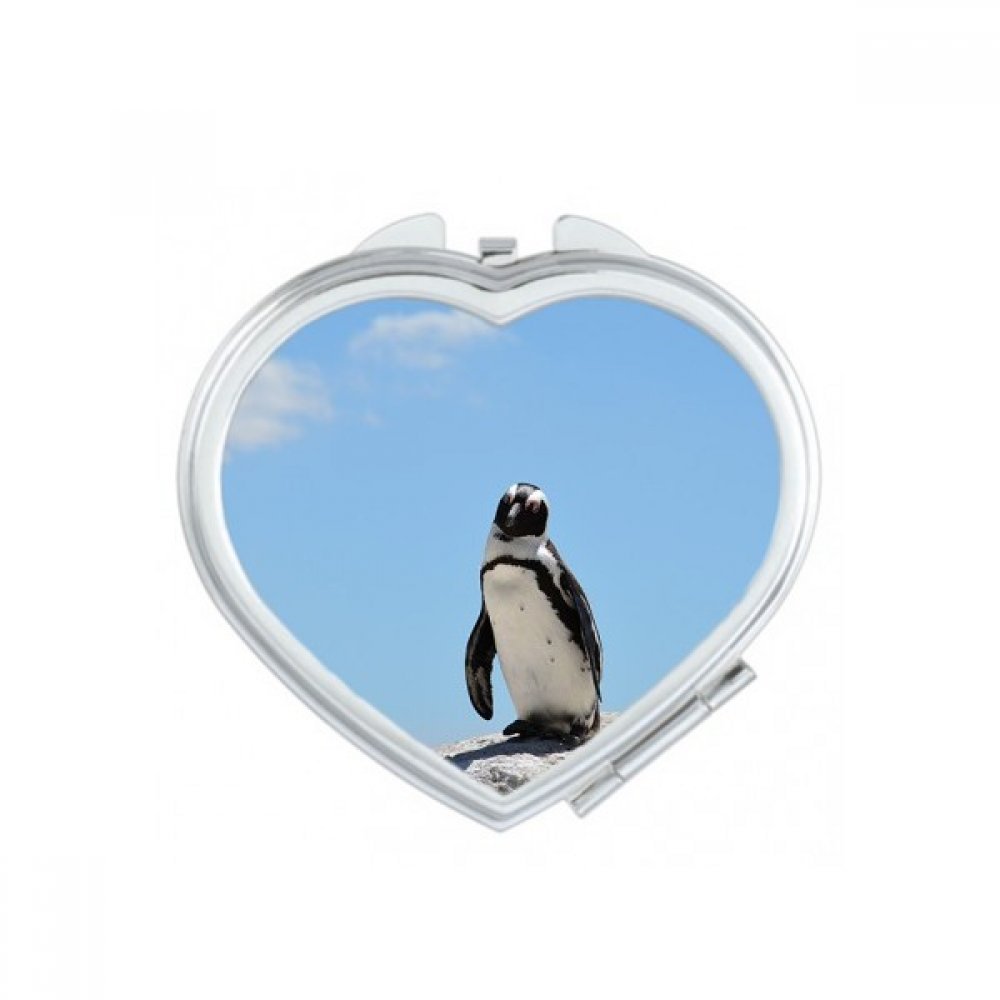 Miroir de maquillage compact coeur pingouin pour vos retouches beauté en voyage