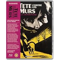 La t&ecirc;te contre les murs