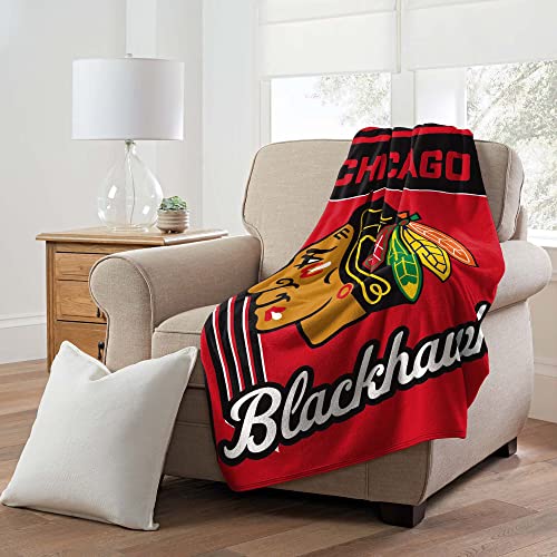 NORTHWEST Officially Licensed Chicago Blackhawks NHL Team Throw Blanket 4660 Licensed Microfiber Throw with Hockey Logos for Fans Dorms Game Day Couches & Fan Caves