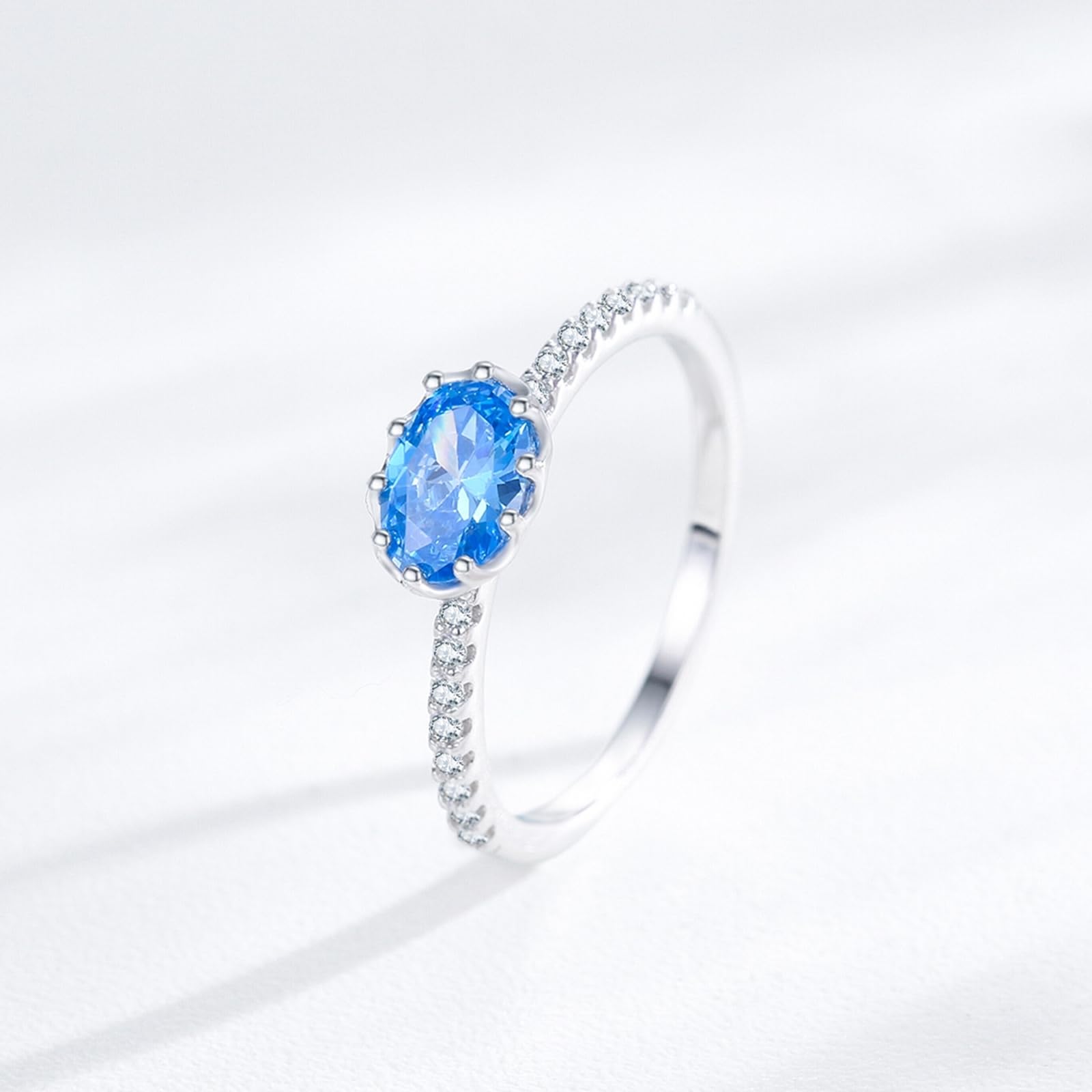 9K białe złoto pierścionek damski, pierścionek 7 x 5 mm topaz niebieski 1ct moissanit