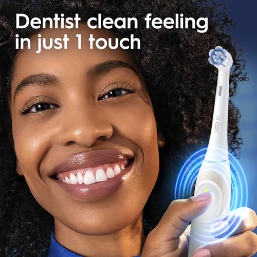 Image of Oral-B Rechargeable Electric Toothbrush, iO Limited Simple Clean, 3 Cleaning Modes, Automatic Pressure Sensor to Protect Gums, Travel Case, Peach