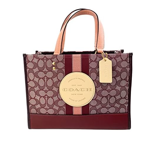COACH Dempsey Carryall In Signature Jacquard With Stripe And COACH Patch Gold/Wine Multi