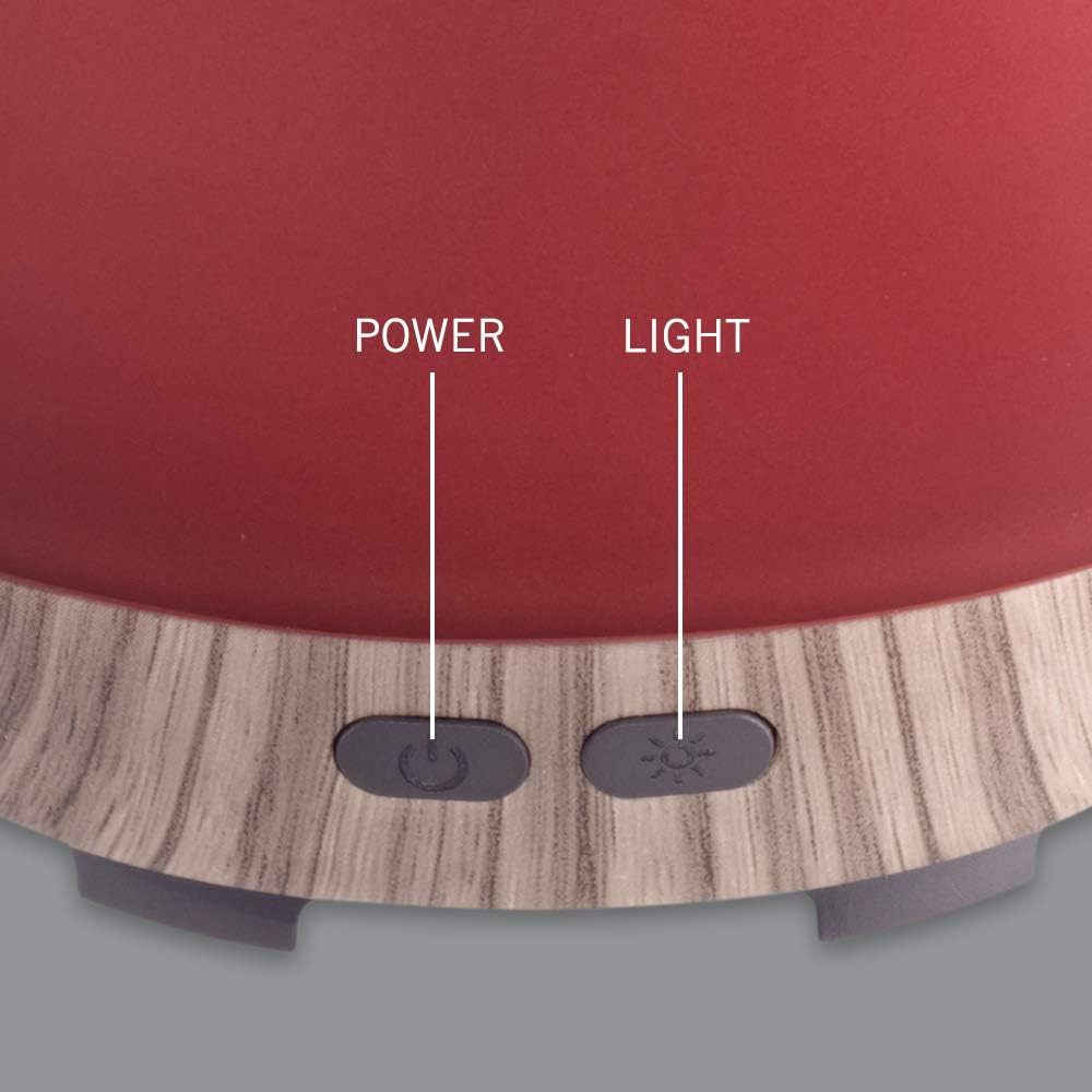 Close-up of the HoMedics Ultrasonic Aroma Diffuser's base showing the 'POWER' and 'LIGHT' buttons.
