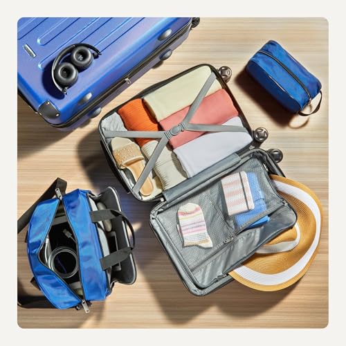 Image of Amazon Basics 4-Piece Hardside Luggage Set with Multidirectional Spinner Wheels, 22 inch Carry-On, 28 inch Checked Suitcase, 15 inch Tote Bag and 10 inch Travel Case, Navy Blue