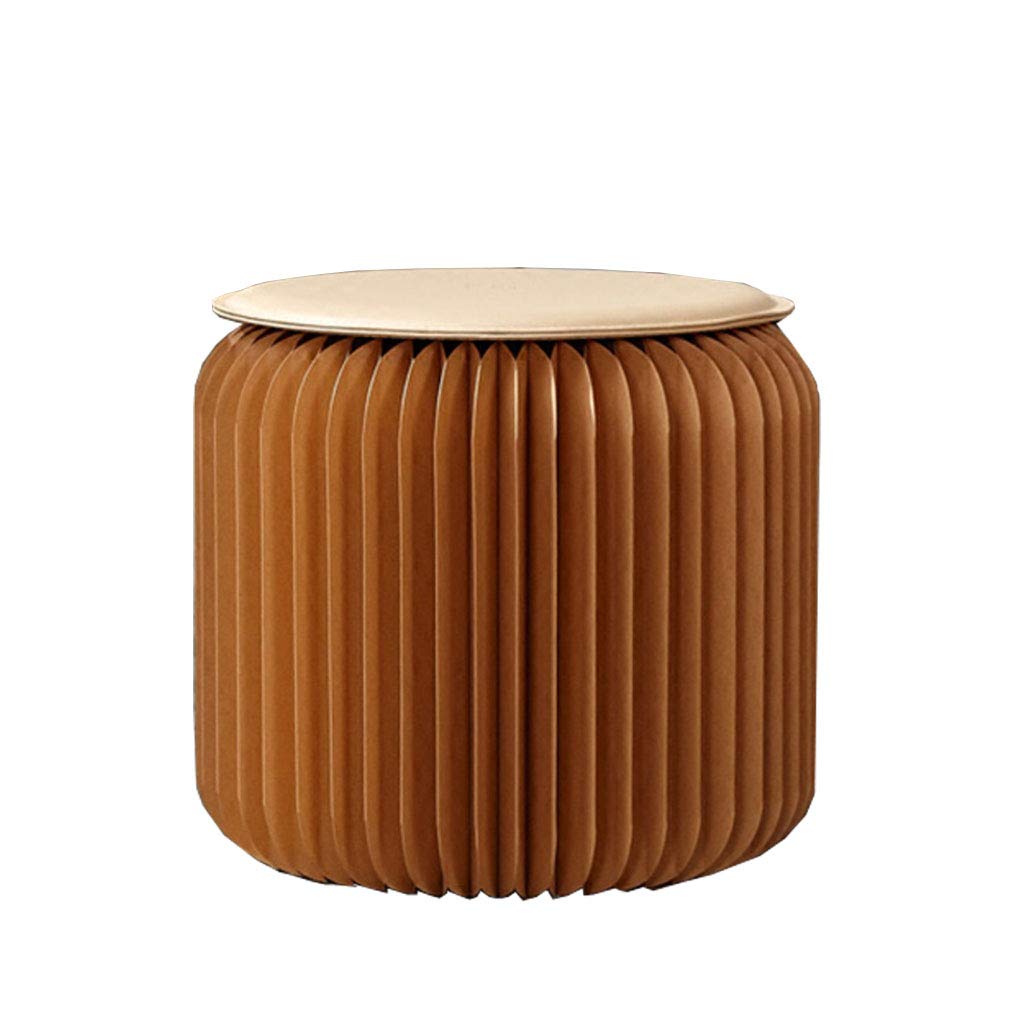 Repose-pieds pouf pliable pour optimiser l'espace des petits salons modernes