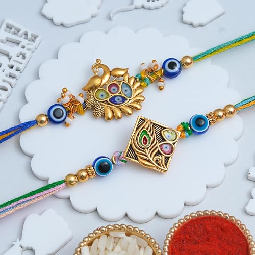 Image of eCraftIndia Peacock Feather Evil Eye Rakhi Set of 2 | Rakhi for Brother Bhaiya Bhai with Best Bro Ever Fridge Magnet | Roli Chawal Pack
