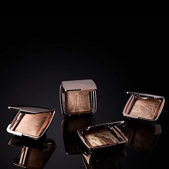 Hourglass Ambient Lighting Bronzer in Luminous Bronze Light. Highlighting Bronzer for a Natural Sun-Kissed Glow