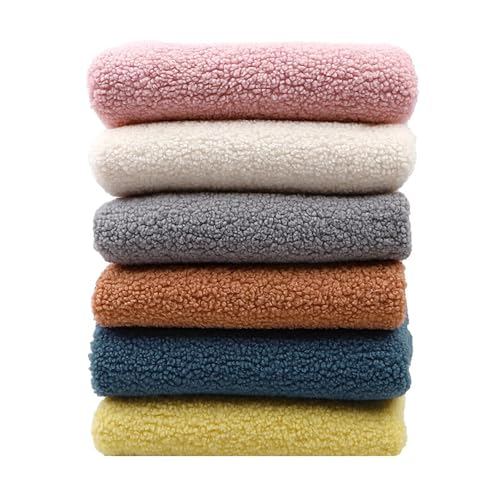 Fausse fourrure polaire duveteuse orange peau d'agneau