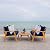 SAFAVIEH Outdoor Collection Deacon Acacia Wood Cushion 4-Piece Conversation Patio Set with Accent Pillows PAT7050E, Navy/Natural