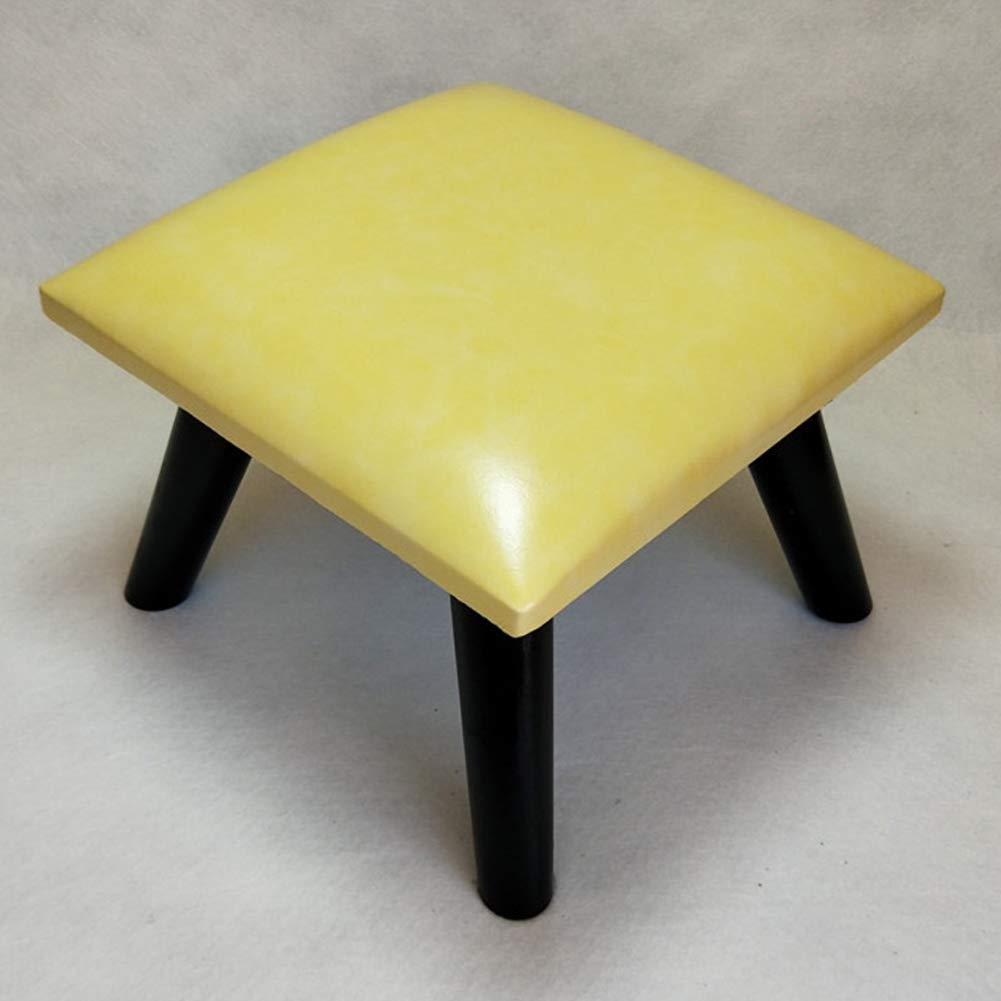 Repose-pieds ottoman compact contre les jambes lourdes au salon