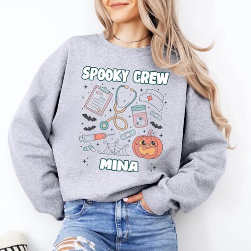 Custom Halloween Nurse Sweatshirt, Personalized Spooky Medical Top with Name and Title, Funny Ghost Pumpkin Design, Gift for Nurses, Nurse Appreciation2