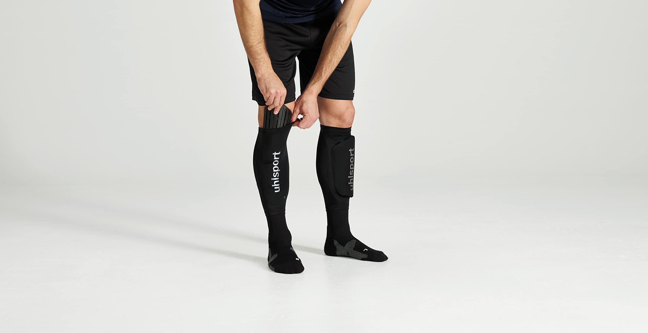 uhlsport Carbonflex Evo Piłka nożna Ochraniacze piszczeli dla dzieci i dorosłych – ultralekkie ochraniacze na golenie piłkarskie z otworami wentylacyjnymi i wysoką amortyzacją uderzeń