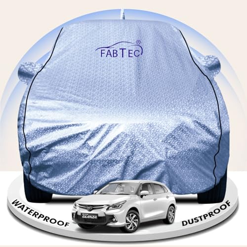 Image of FABTEC Metallic Silver Waterproof Car Body Cover for Toyota Glanza Sun, UV and Dust Protection with Mirror and Antenna Pocket (Reflective Silver with Black Piping)