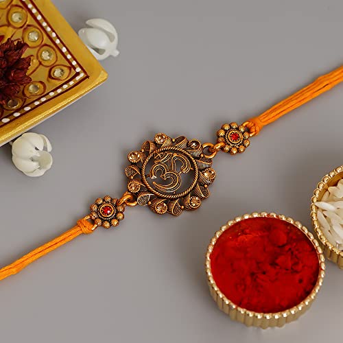 Image of eCraftIndia Orange Religious Om Rakhi for Brother with Best Bro Ever Fridge Magnet & Roli Chawal Pack | Raksha Bandhan Rakhi for Bhaiya Bhai | Traditional Spiritual Festive Thread