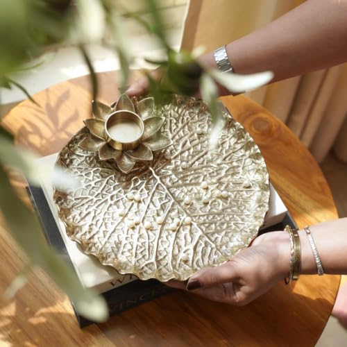 Image of BEHOMA Golden Metal Lotus Pooja Thali with Tea-Light Holder, 25.5cm | Golden lotus-design metal tray with tea-light holder; perfect pooja thali for weddings, haldi & mehndi.