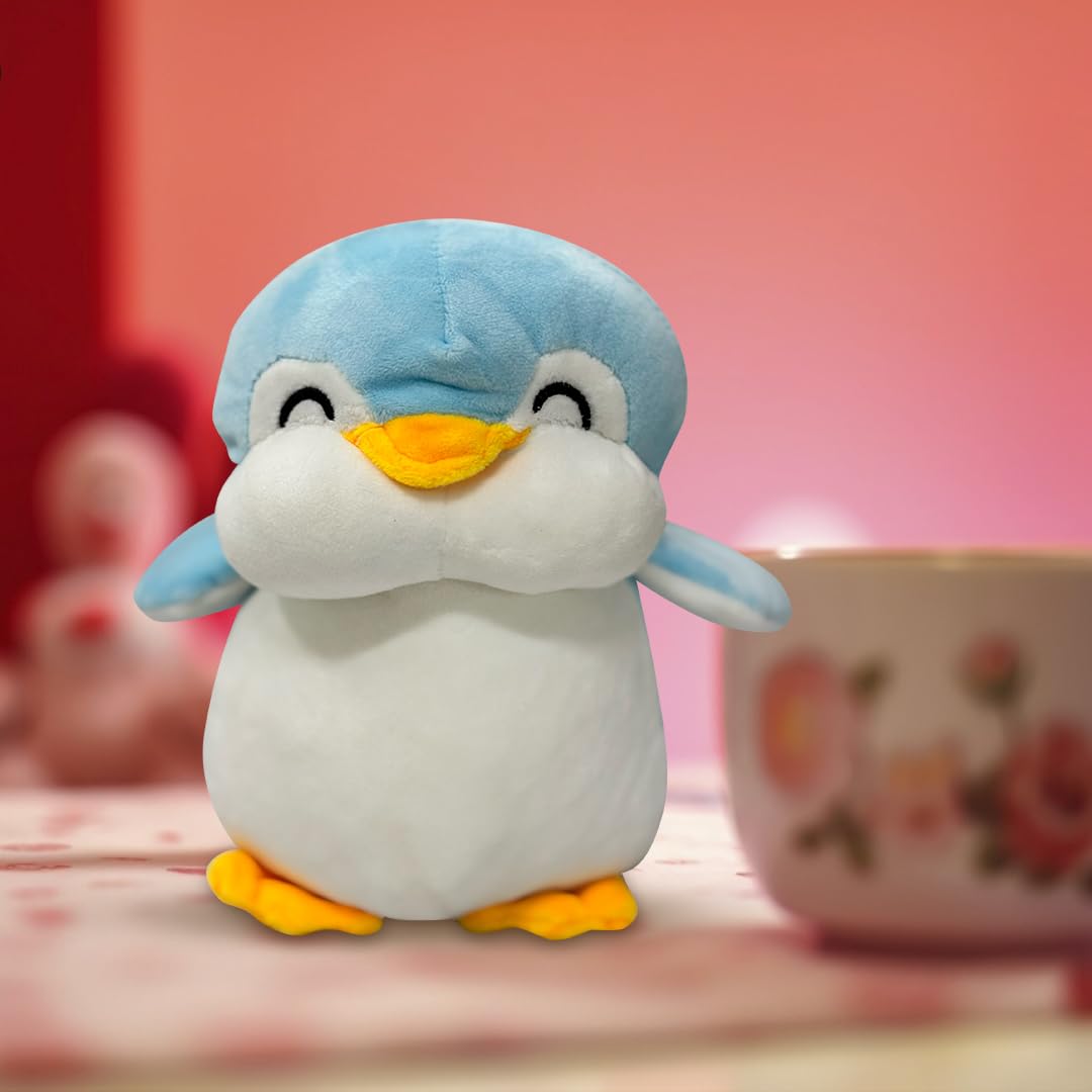 EITHEO Baby Stuffed Animal Plushie β 25 cm Huggable Soft Teddy Plush Toy for Kids, Girls & All Ages, Adorable Cuddly Stuffed Toy, Multicolor (Penguin Blue) 1