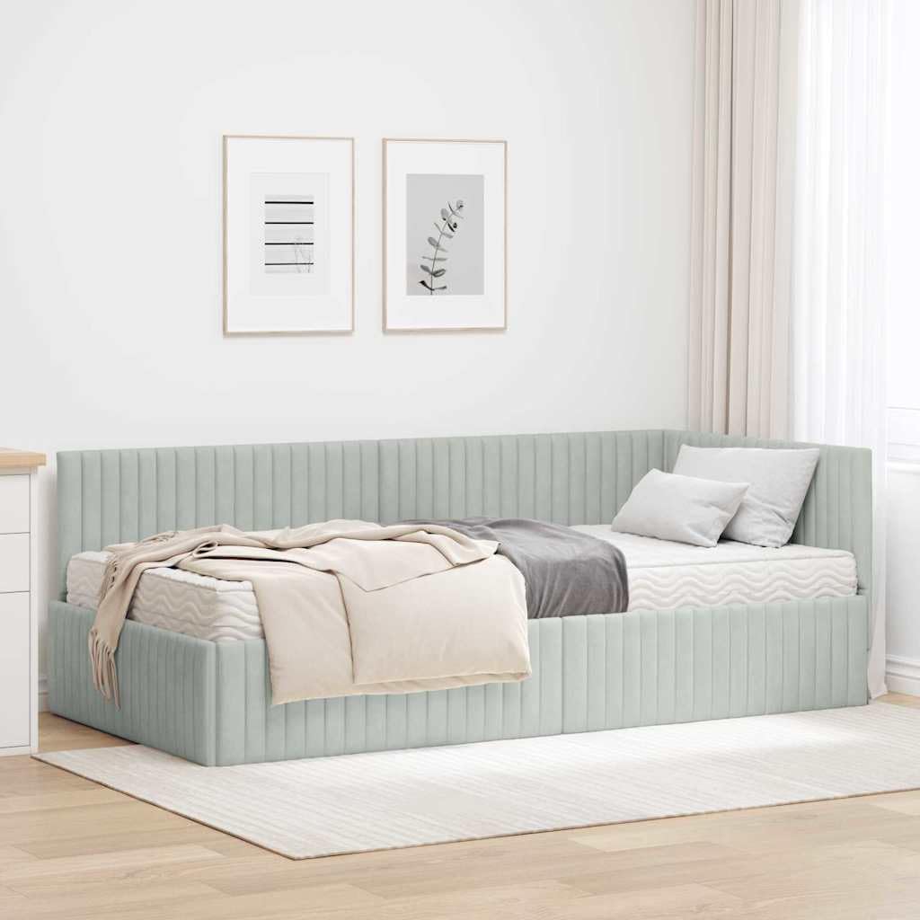 Struttura letto angolare in velluto grigio chiaro con materasso 2 pezzi supporto robusto e testata montata a parete ideale per camere moderne e funzionali