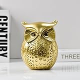 Complète divers paramètres de décoration d'intérieur : avec son design polyvalent, cette statue de hibou complète parfaitement divers paramètres de décoration d'intérieur. Qu'il s'agisse d'orner des étagères, des bibliothèques, des cheminées ou des étagères de salle de bain, il ajoute sans effort une touche de fantaisie et de charme à n'importe quelle pièce.