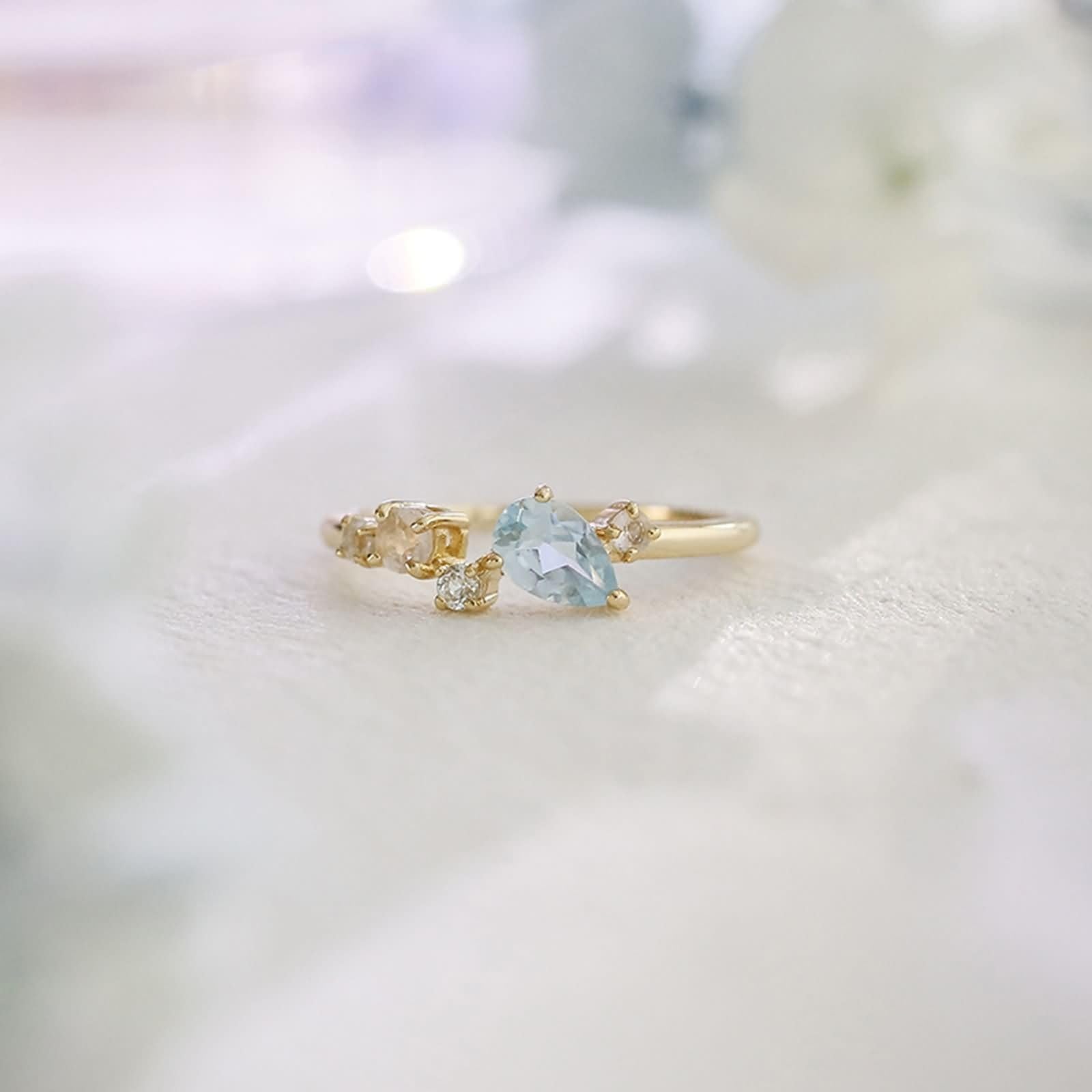 Anillo de compromiso de oro 9 K/14 K/18 K con gotas de topacio azul claro, forma de lágrima