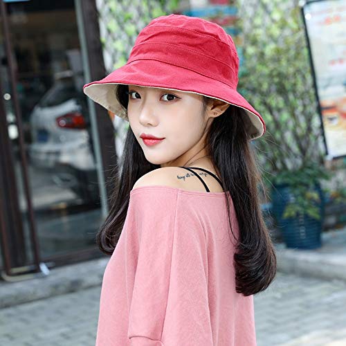 波のそばの漁師帽