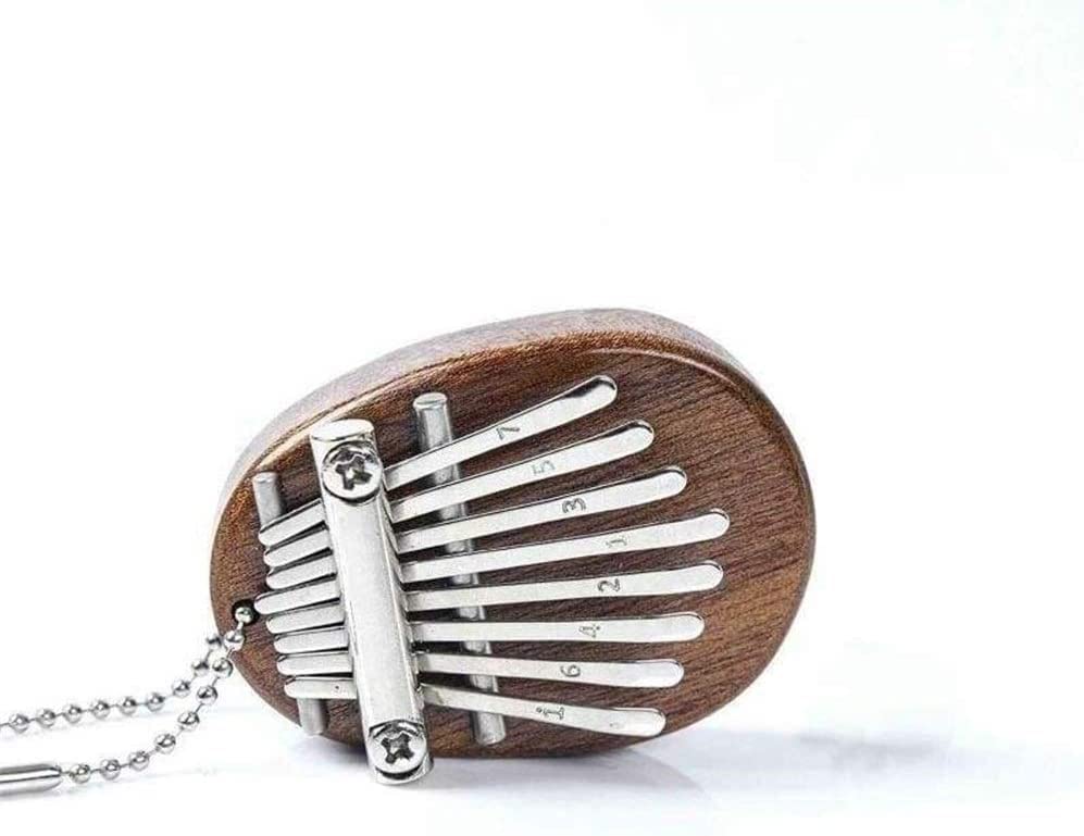 Mini Doigt Kalimba Pouce Piano 8 Touches Mini Pouce Piano Doigt Percussion Instrument Kalimba Instrument De Musique… - Les Beatles, Paul McCartney, John Lennon, RIngo Starr, George Harrison Mini Doigt Kalimba Pouce Piano 8 Touches Mini Pouce Piano Doigt Percussion Instrument Kalimba Instrument De Musique… – Image 5