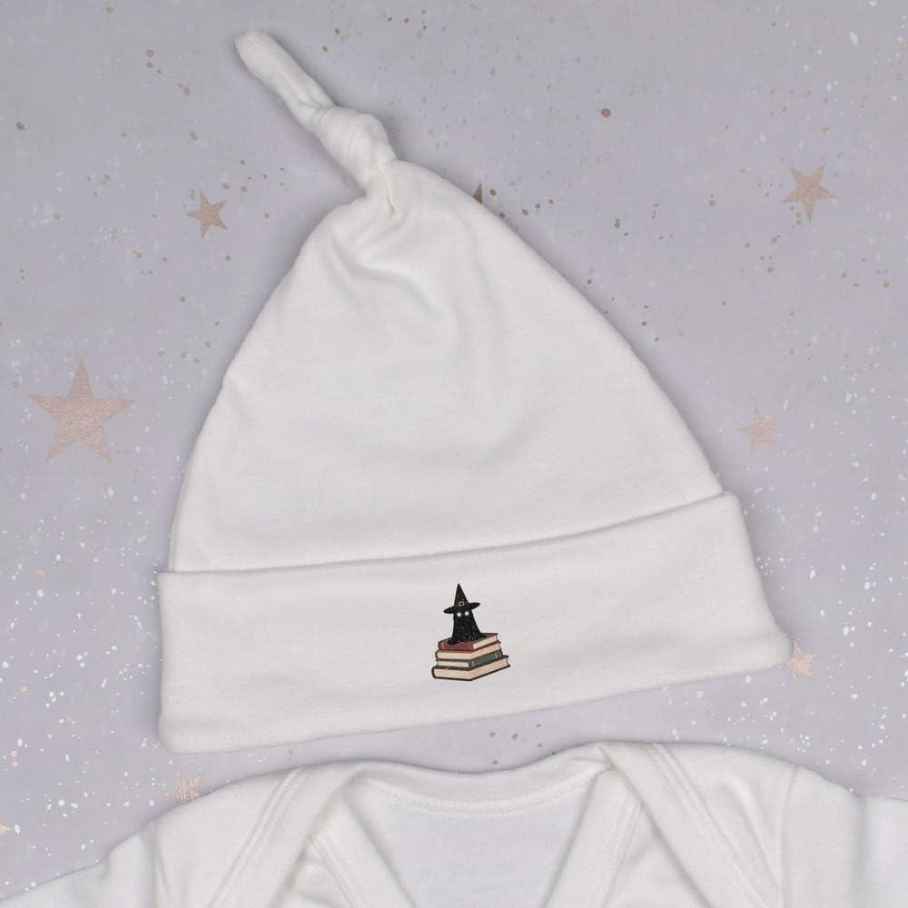 Azeeda 'Ghostly Spirit Perched on Spellbooks' Baby Beanie Hat (BH00041078) White