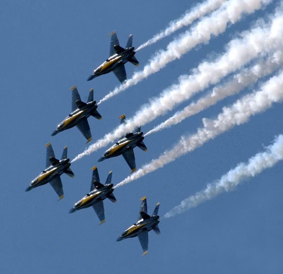 The US Navy (USN) Flight Demonstration Team Blue at the 2004 Elmendorf Air Force Base (AFB), Alaska (AK), Air Show "Arctic Thunder" perform special maneuvers - 12 Inch by 18 Inch Laminated Poster - Bright Colors And Vivid Imagery