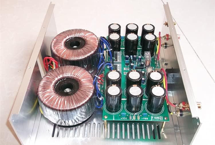Close-up view of internal components, focusing on one transformer and circuit board