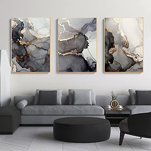 Toile abstraite dorée et noire 60x80cm pour réveiller un salon triste