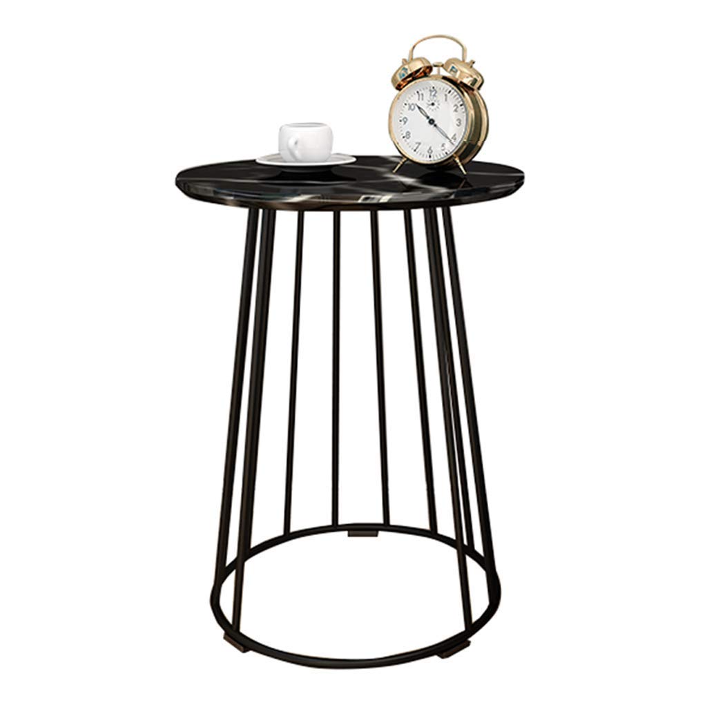 Canapé table de téléphone noire ronde pour ne plus chercher vos affaires