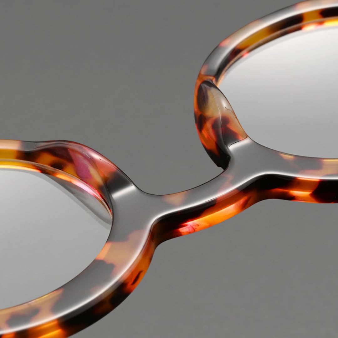 Occhiali da sole rotondi in acetato, montatura alla moda vintage.
