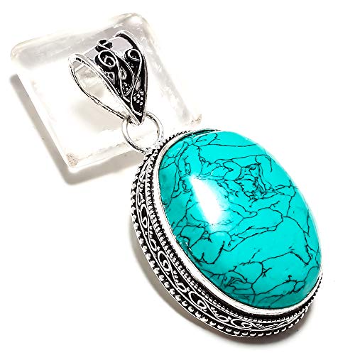 Pendentif Père Noël turquoise en argent : le cadeau fait main idéal
