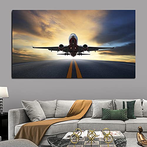 Toile de salon coucher de soleil et avion pour créer une ambiance évasion