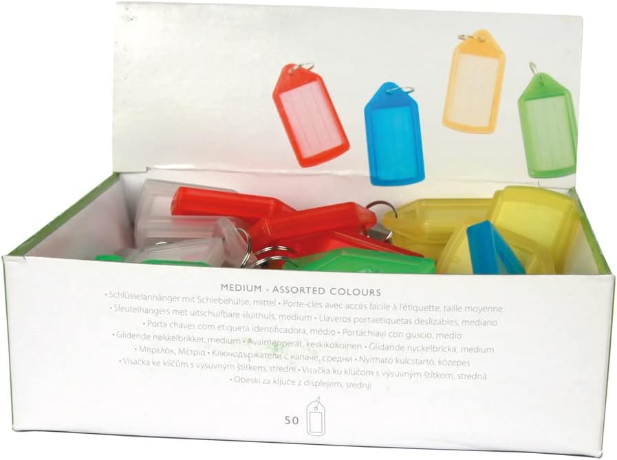 An open box containing numerous Q-Connect assorted sliding key fobs, demonstrating how they are packaged and stored.