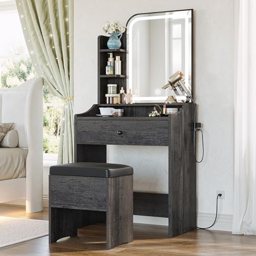 Image of LIKIMIO Small Vanity Desk with Mirror Lights and Storage Stool | Charcoal grey compact vanity with 3 light modes, charging station, storage drawer, 3 shelves and upholstered stool