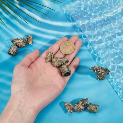 Disco de cobre para baño de pájaros OLYCRAFT con 4 figuras de pelícano 4