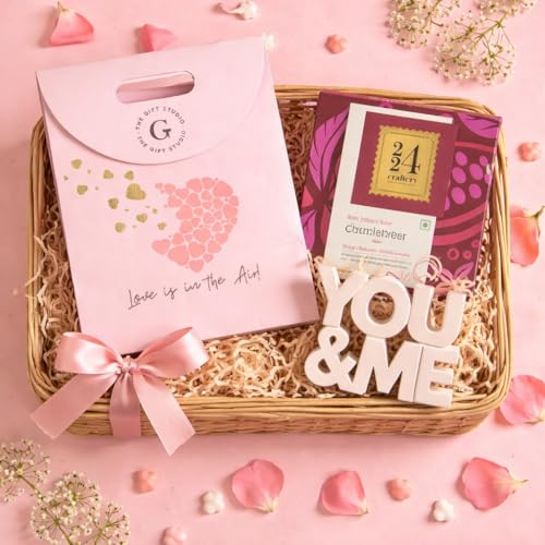 THE GIFT STUDIO.COM Valentine Gifts for Girlfriend, Valentine Gifts for Boyfriend, Valentine Gifts for Wife, Valentine Gifts for Husband, Valentine Gifts for Couples, Romantic Gifts for Valentine Day, | You & Me Premium Love Hamper | Love Is In The Air Gift Bag with You & Me Table Top Décor & 224 Rose Infused Ruby Chocolate Bar | Anniversary & Valentine gift for Girlfriend and Boyfriend