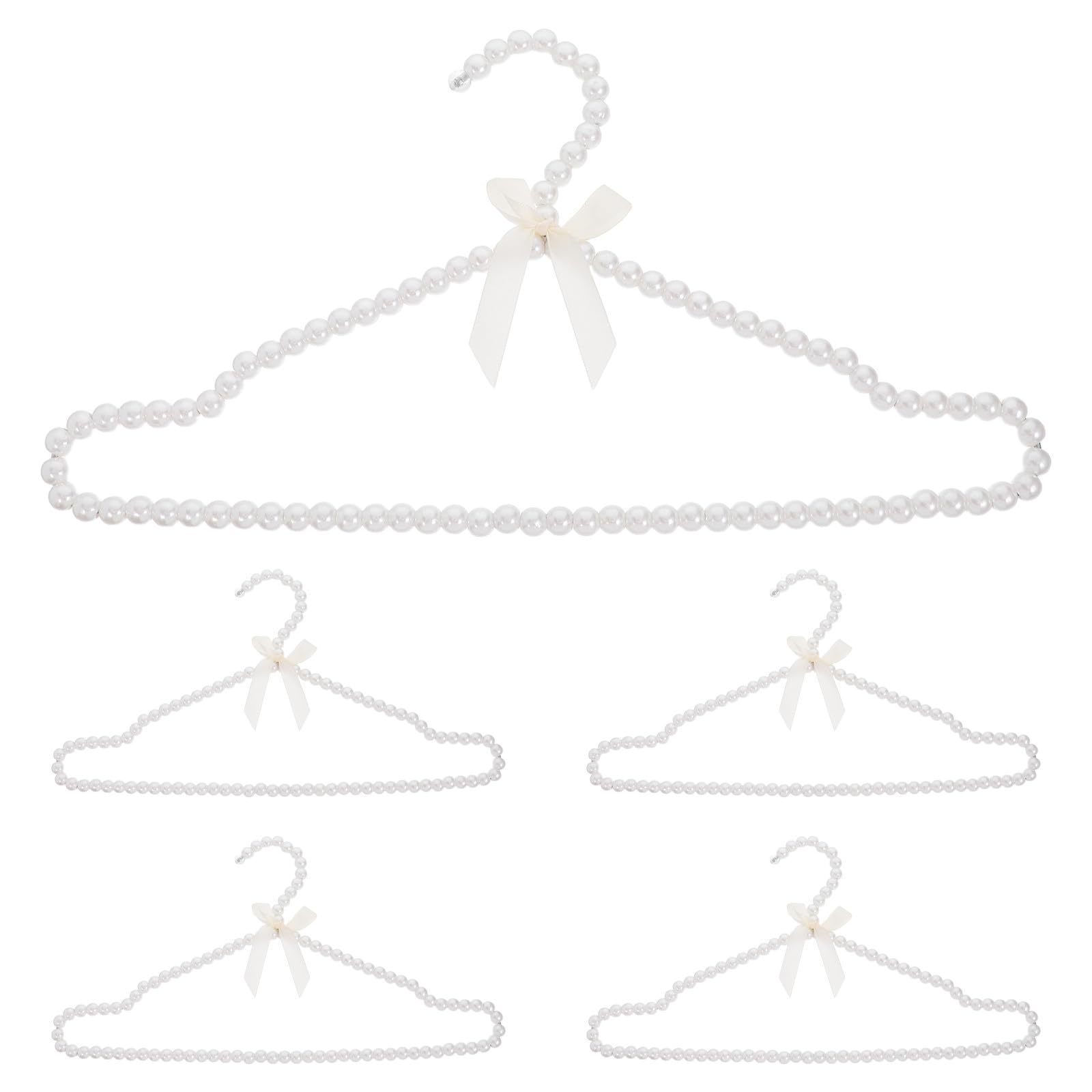 Cintres en plastique blanc perles pour organiser votre dressing de mariée avec élégance