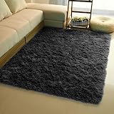 Esta hermosa y asequible alfombra de poliéster con pelo acolchado a mano está disponible en varios colores y se adapta a sus necesidades en la silla de la computadora, el escritorio, la mesa de té, el sofá, el cubículo de la estación de trabajo, etc.