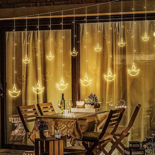 Image of HashWOW 3 Meter 12 Diyas Curtain Led Festive Lights, Warm White Diya /Diwali Light Curtain Indoor Window String Lights, Decoration for Wedding, New Year & Home, 6 Large &6 Small Diyas, Pack of 1