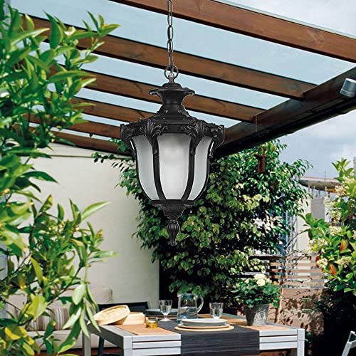 Lámpara de porche vintage en metal bronce para iluminar cenas de exterior en el jardín