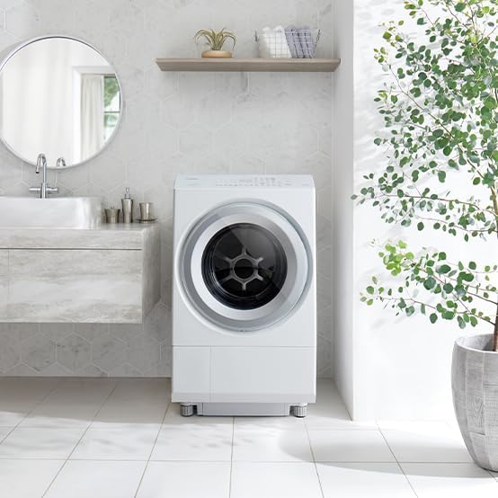 Toshiba TW-127XH4R-W Drum-Type Washer Dryer in a bathroom setting